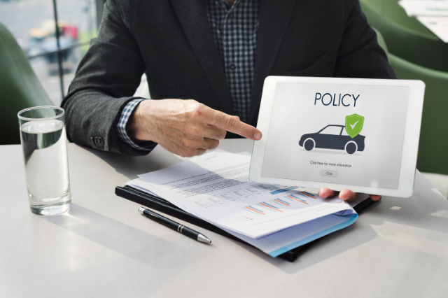 Agent pointing to a policy on a tablet